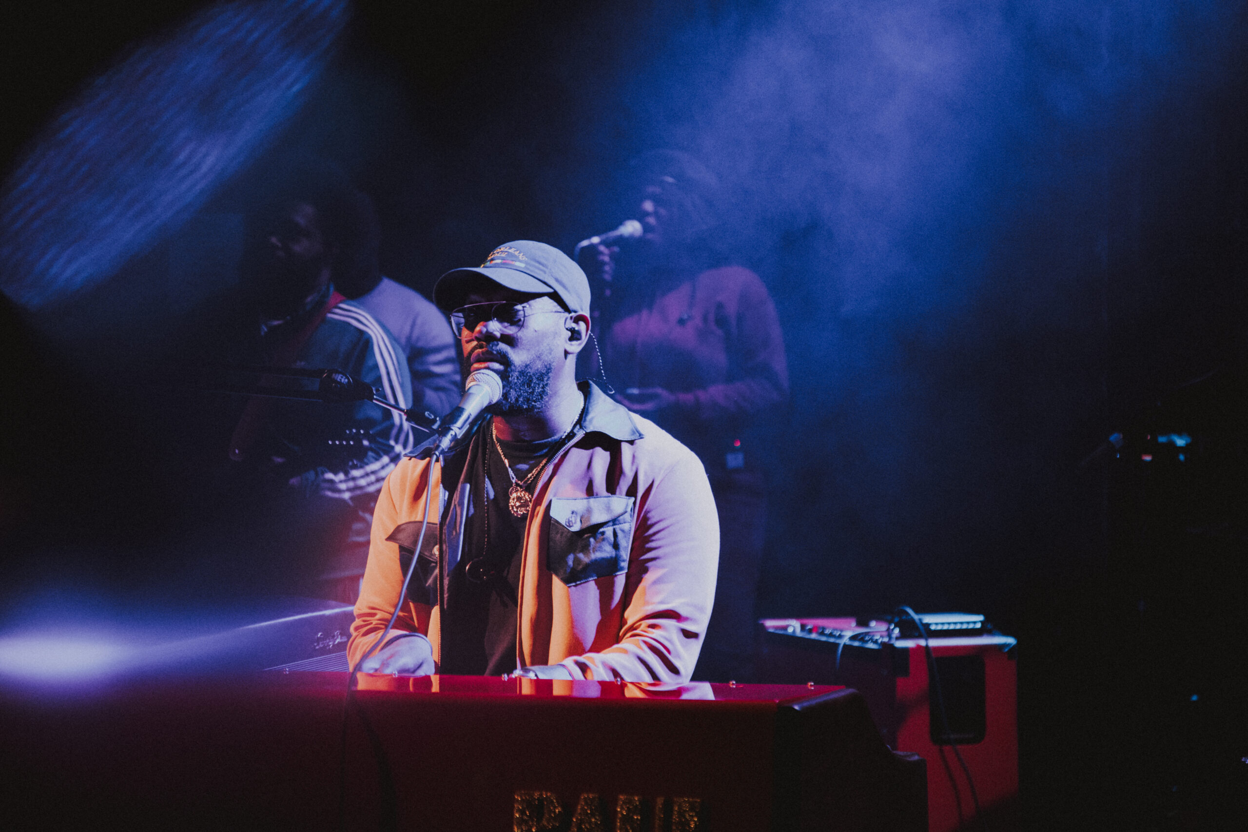 PJ Morton performing live on stage